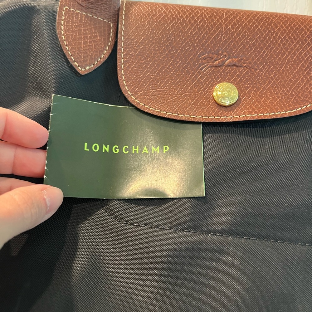 Long champ tote, black, medium size. Not used often! Maybe only once or twice.